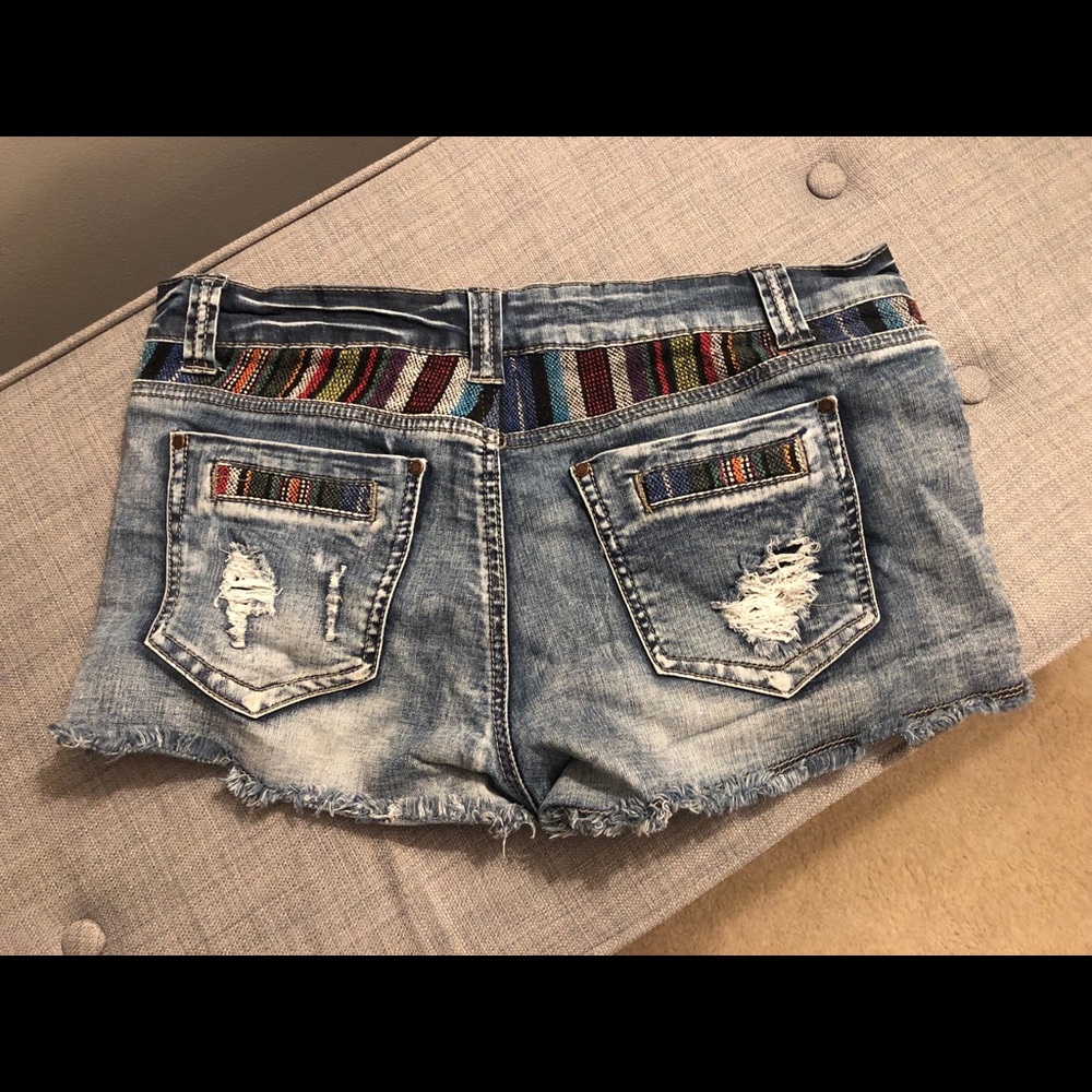 Free People distressed denim shorts